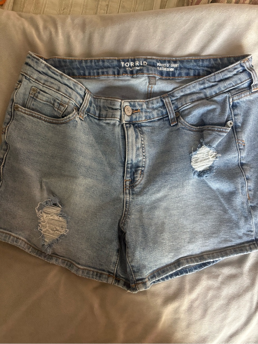 torrid light blue distressed denim shorts